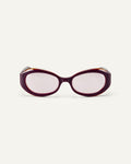 Face shot of Bonnie Clyde XOXOx2 sunglasses in dark pink with pink lenses.