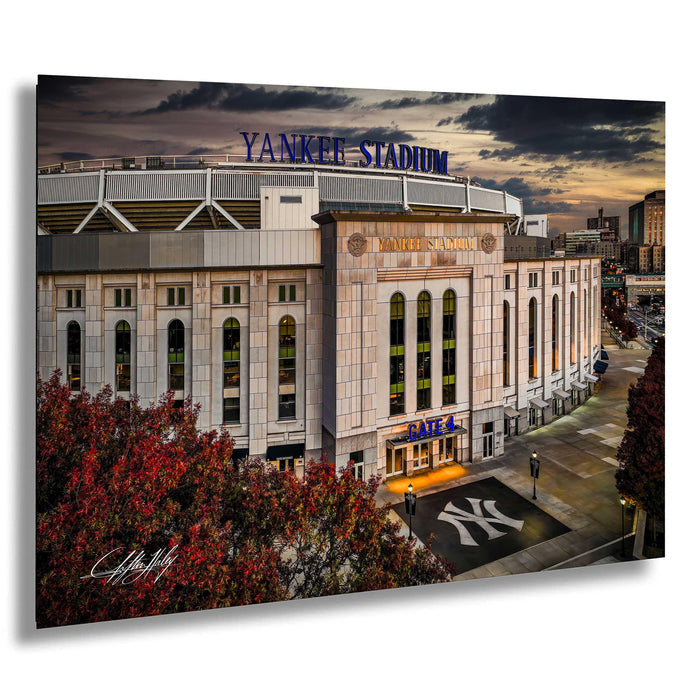 a large stadium with the name "Yankees Stadium" prominently displayed.